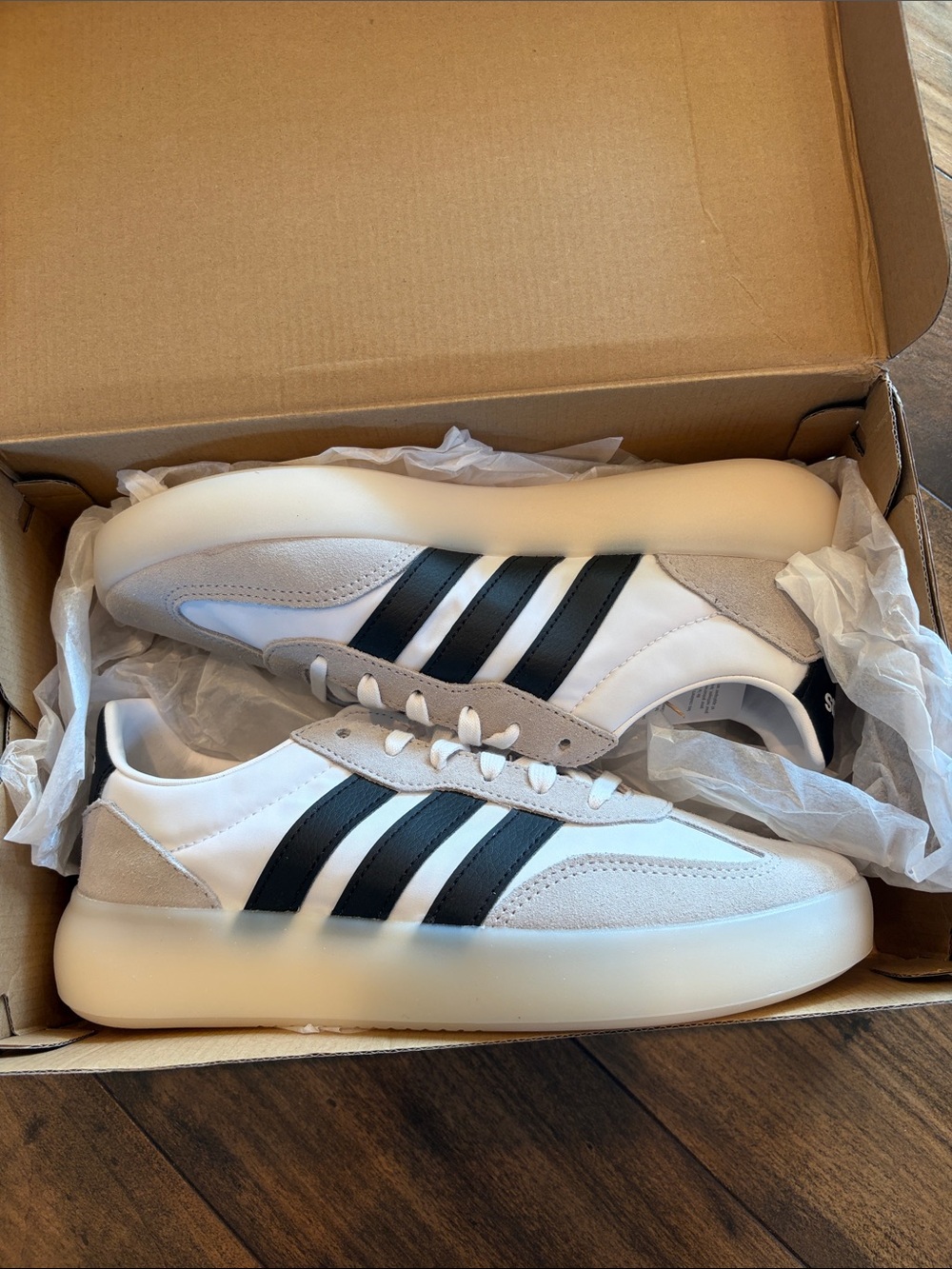 adidas Women’s White Sneakers with Black Stripes